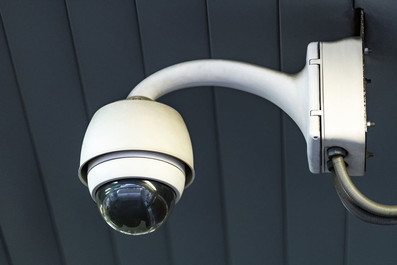 Security camera mounted on a wall